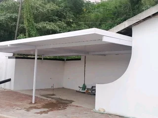 CARPORT AND PAVING