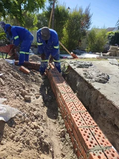 Bricklaying plastering and skimming