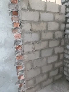 Bricklaying, plastering and skimming