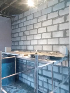 Bricklaying, plastering and skimming