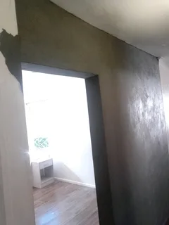 Bricklaying, plastering and skimming