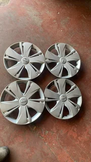 14 Inch Nissan Wheel Covers (Set of 4)	•	Size: 14 inch	•	Genuine Nissan OEM wheel caps	•	Fit: Nissan