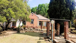 Large property with serene three bedroom home for sale.