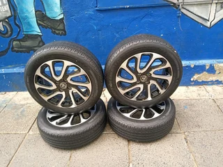 A set of 16inches 4x100 PCD with 90% thread tyres for toyota starlet/toyota yaris/ toyota runx
