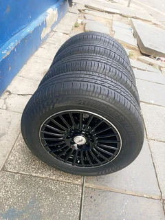 A set of 14inches universal PCD 4x100 4x108 PCD rims with tyres for toyota runx/Etios/Datsun Go