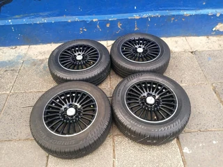 A set of 14inches universal PCD 4x100 4x108 PCD rims with tyres for toyota runx/Etios/Datsun Go