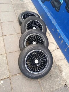 A set of 14inches universal PCD 4x100 4x108 PCD rims with tyres for toyota runx/Etios/Datsun Go