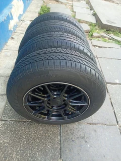 A set of 14inches universal PCD 4x100 /4x108 PCD mags with tyres for Toyota runx/ etios /Datsun Go