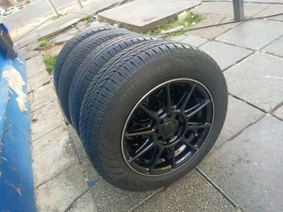 A set of 14inches universal PCD 4x100 /4x108 PCD mags with tyres for Toyota runx/ etios /Datsun Go