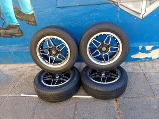 A set of 15inches universal PCD 4x100 and 4x108 PCD rims with tyres for toyota/ hyundai i20 /opel