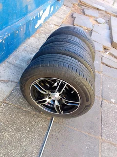 set of 14inch universal PCD 4x100 /4x108 PCD mags with tyres for Toyota Etios/Runx/KIA picanto/Honda