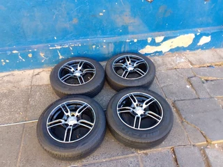 set of 14inch universal PCD 4x100 /4x108 PCD mags with tyres for Toyota Etios/Runx/KIA picanto/Honda