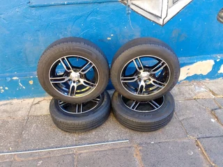 set of 14inch universal PCD 4x100 /4x108 PCD mags with tyres for Toyota Etios/Runx/KIA picanto/Honda