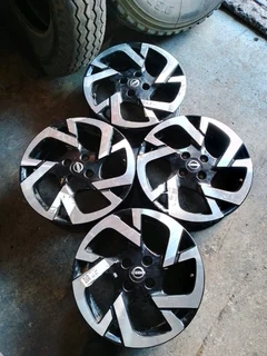 A set of 16inch original nissan magnite mags 4x100 p c d also fit nissan micra/almera/renault clio