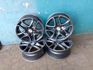 A set of 15inches universal p c d 4x100 / 4x108 p c d Rims for toyota runx/etios/Datsun Go