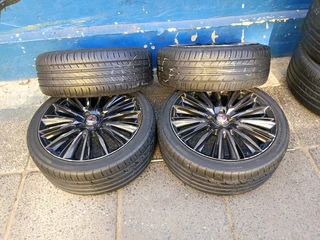 A set of 17inches mags 4x100 pcd with 90% thread life tyres for kia rio/renault clio/toyota runx