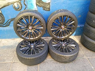 A set of 17inches mags 4x100 pcd with 90% thread life tyres for kia rio/renault clio/toyota runx