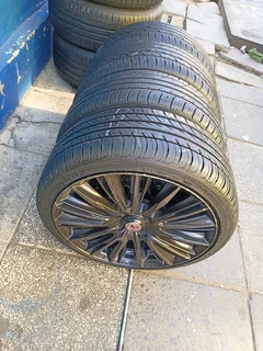 A set of 17inches mags 4x100 pcd with 90% thread life tyres for kia rio/renault clio/toyota runx
