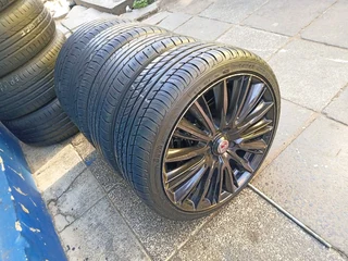 A set of 17inches mags 4x100 pcd with 90% thread life tyres for kia rio/renault clio/toyota runx