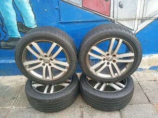 A set of 20inches original Audi Q7 mags 5x130 PCD with tyres. Also fit porsche cayenne / VW Touareg