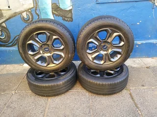 A set of 16inches original Ford Ecosport mags 4x108 PCD with tyres also fit ford bantam/ ford fiesta