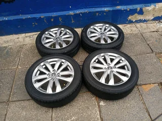 A set of 16inches original mags rim 4x100 PCD with tyres for toyota starlet/suzuki swift/ hyundai