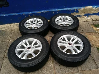 A set of 17inches original isuzu Dmax bakkie or isuzu suv mags rim 6x139.7 pcd with 265/65R17 Dunlop