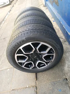 A set of 20inches original Ford Ranger Wildtrak mags 6x139.7 PCD with 95% thread Goodyear tyres