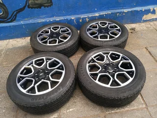 A set of 20inches original Ford Ranger Wildtrak mags 6x139.7 PCD with 95% thread Goodyear tyres