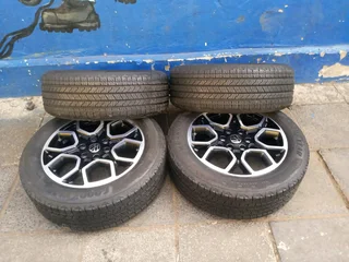 A set of 20inches original Ford Ranger Wildtrak mags 6x139.7 PCD with 95% thread Goodyear tyres