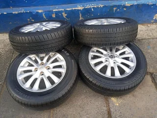 set of 15inches original Toyota etios mags 4x100 PCD with tyres also fit toyota corolla/ Toyota Runx