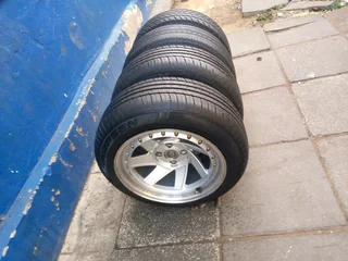 A set of 15inches deep dich mags 4x100 PCD with tyres for Toyota Runx /Etios /Datsun Go /Hyundai i20