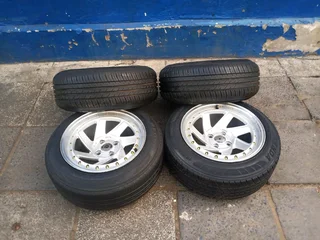A set of 15inches deep dich mags 4x100 PCD with tyres for Toyota Runx /Etios /Datsun Go /Hyundai i20