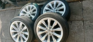 A set of 17inches original Audi A4 mags 5x112 PCD with tyres. They also fit Audi A3 A5 and VW Golf 5