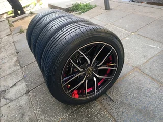 A set of 15inches universal PCD 4x100 / 4x114.3 PCD rims with tyres for Toyota/Datsun Go/Hyundai i20