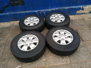 A set of 16inches original Ford Ranger mags with tyres. This set are in perfect condition