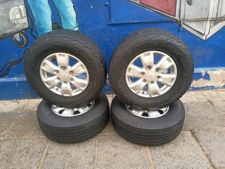 A set of 16inches original Ford Ranger mags with tyres. This set are in perfect condition