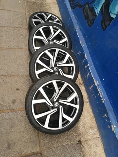A set of 18inches original VW polo mags 5x100 PCD with tyres also fit Audi A1 or any 5x100 PCD car