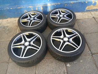 A set of 18inches OEM/ original AMG Mags 5x112 PCD with Runflat continental tyres for Mercedes Benz