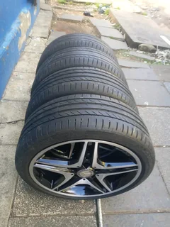 A set of 18inches OEM/ original AMG Mags 5x112 PCD with Runflat continental tyres for Mercedes Benz