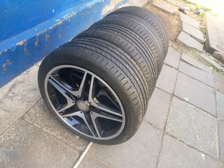 A set of 18inches OEM/ original AMG Mags 5x112 PCD with Runflat continental tyres for Mercedes Benz