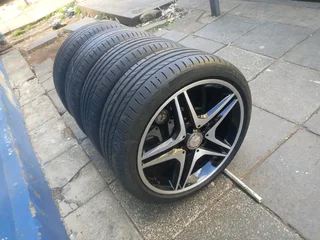 A set of 18inches OEM/ original AMG Mags 5x112 PCD with Runflat continental tyres for Mercedes Benz
