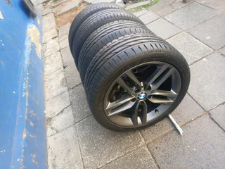 A set of 18inches original BMW 1 and 2 series mags 5x120 PCD Narrow and wide with Runflat tyres