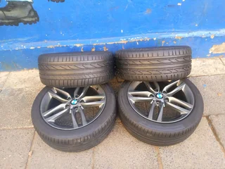 A set of 18inches original BMW 1 and 2 series mags 5x120 PCD Narrow and wide with Runflat tyres