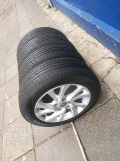A set of 16inches original Toyota corolla prestige mags 5x114.3 PCD with tyres.Also fit Toyota corol