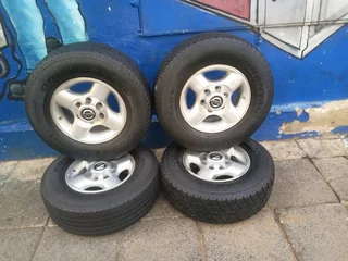 A set of 16inches original Nissan hardbody NP300 mags 6x139.7 PCD with tyres. Also fit Isuzu bakkie