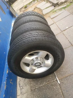 A set of 16inches original Nissan hardbody NP300 mags 6x139.7 PCD with tyres. Also fit Isuzu bakkie