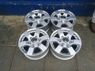 A clean set of 16inches original Nissan hardbody NP300 mags 6x139.7 PCD. Also fit Isuzu bakkie /ford