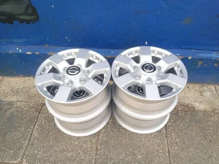 A clean set of 16inches original Nissan hardbody NP300 mags 6x139.7 PCD. Also fit Isuzu bakkie /ford