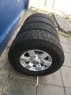 A clean set of 16inches original Nissan hardbody NP300 mags 6x139.7 PCD with Bridgestone tyres